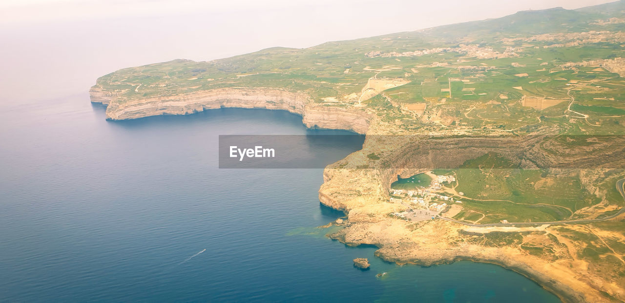 AERIAL VIEW OF SEA AND ROCK FORMATIONS