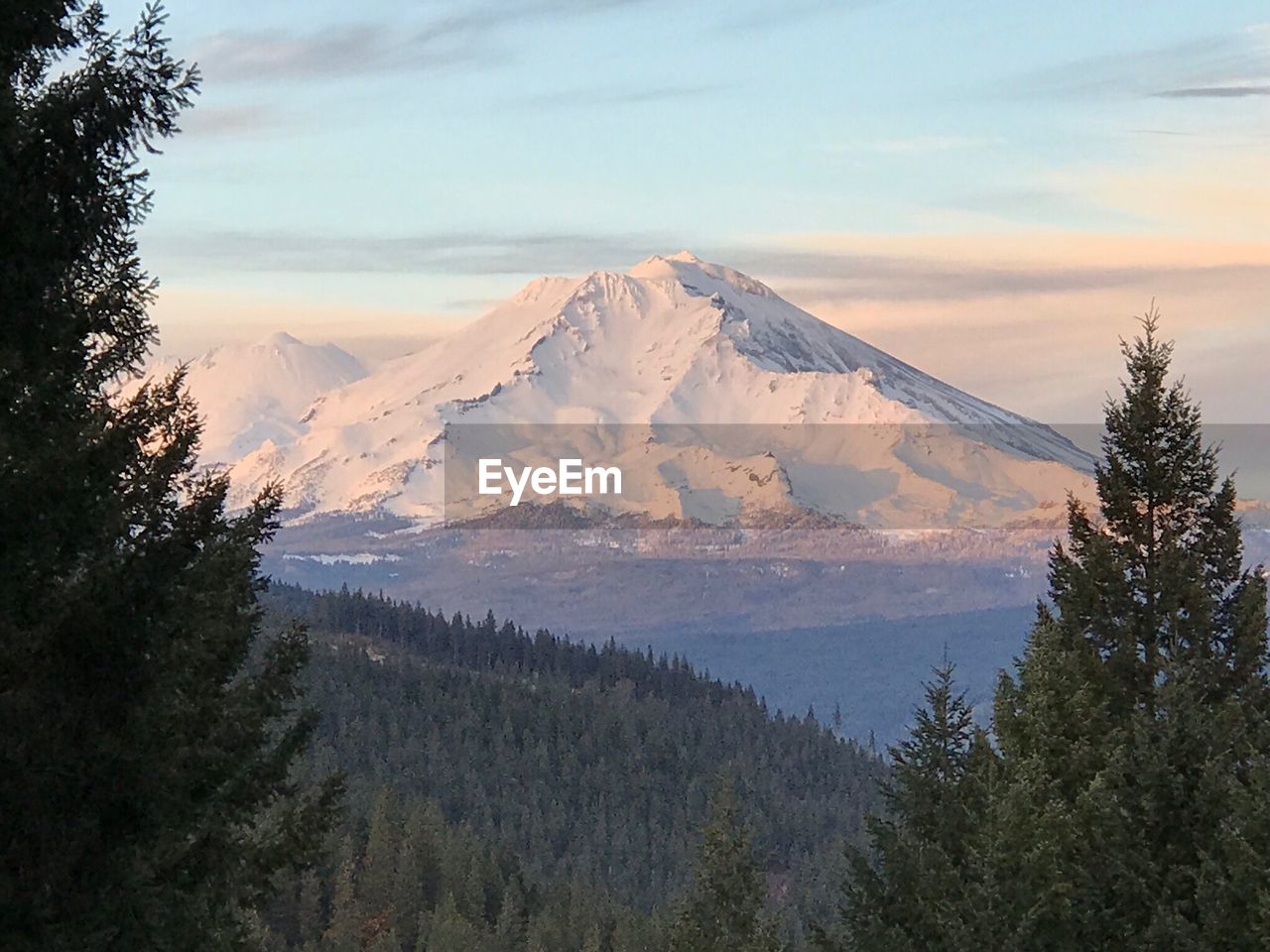 Scenic view of mountains against sky during winter