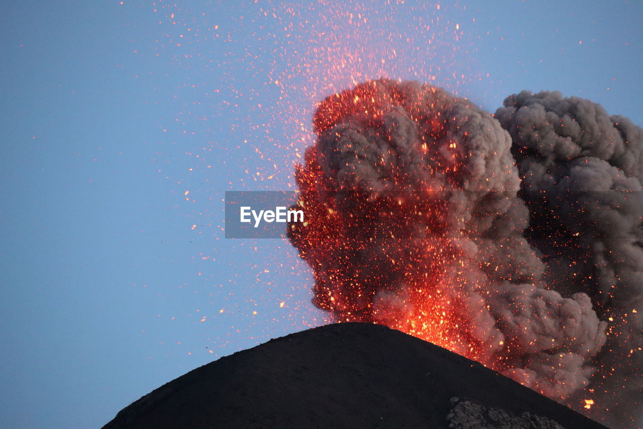 Fire and ashes eruption of volcano fuego, guatemala 