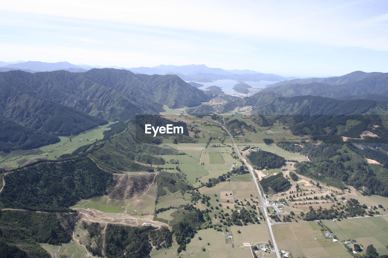 Aerial view of agricultural landscape against sky