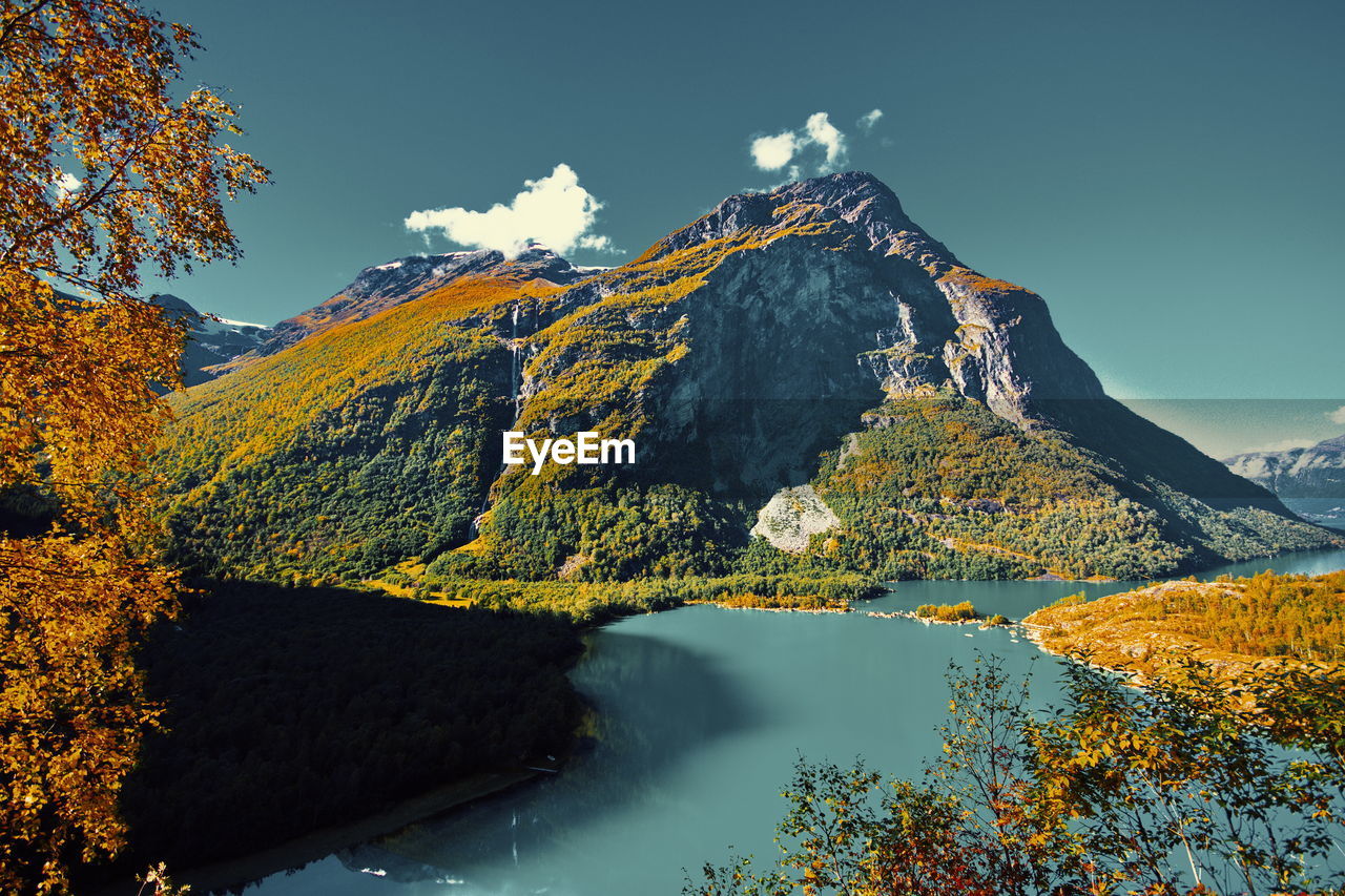 Scenic view of lake against sky during autumn