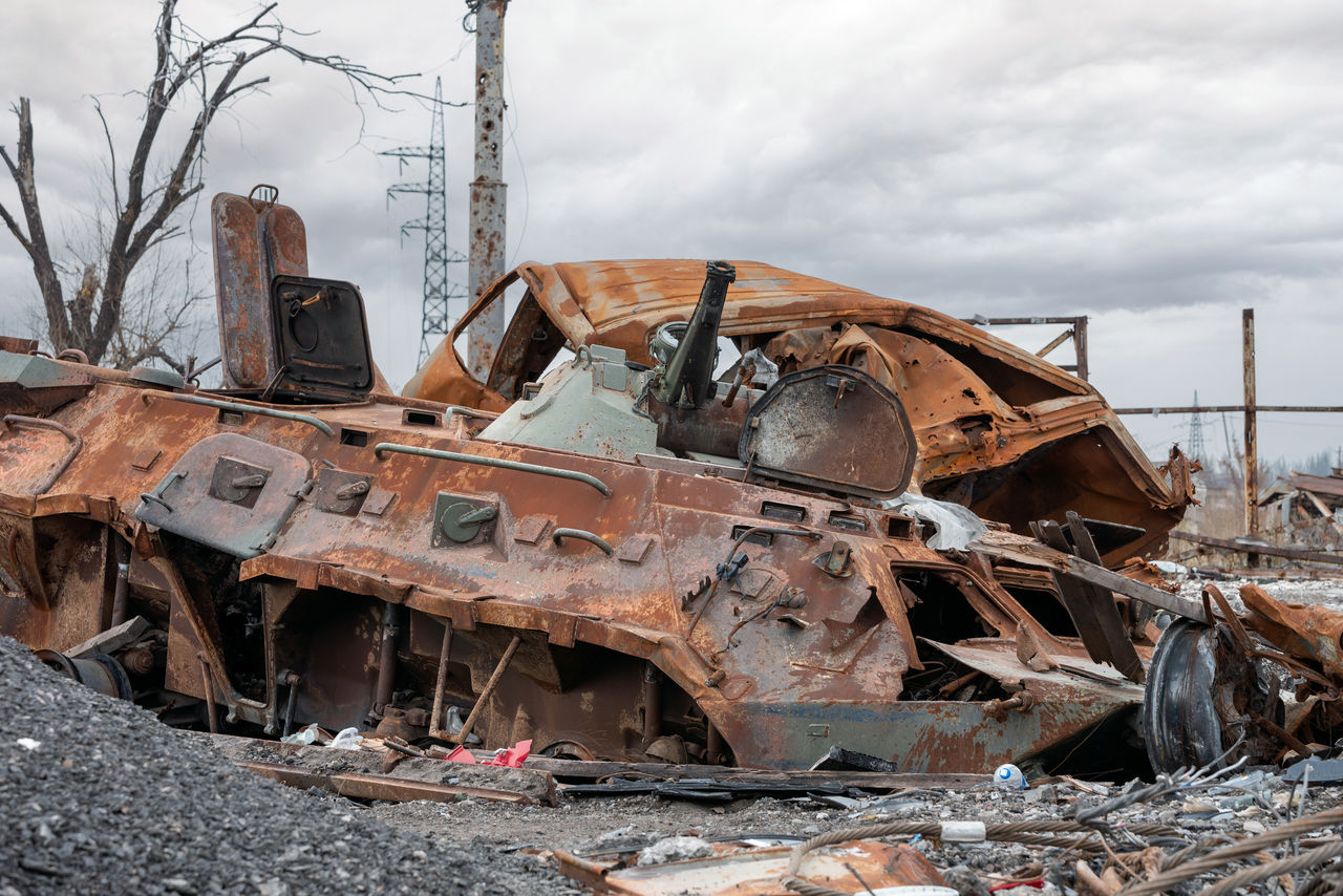 abandoned vehicle on field