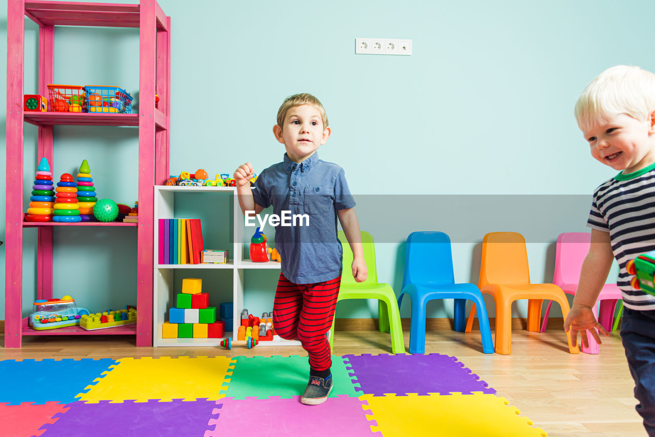 Students running in classroom