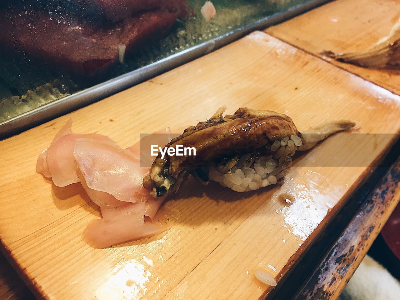 CLOSE-UP OF SUSHI ON TABLE