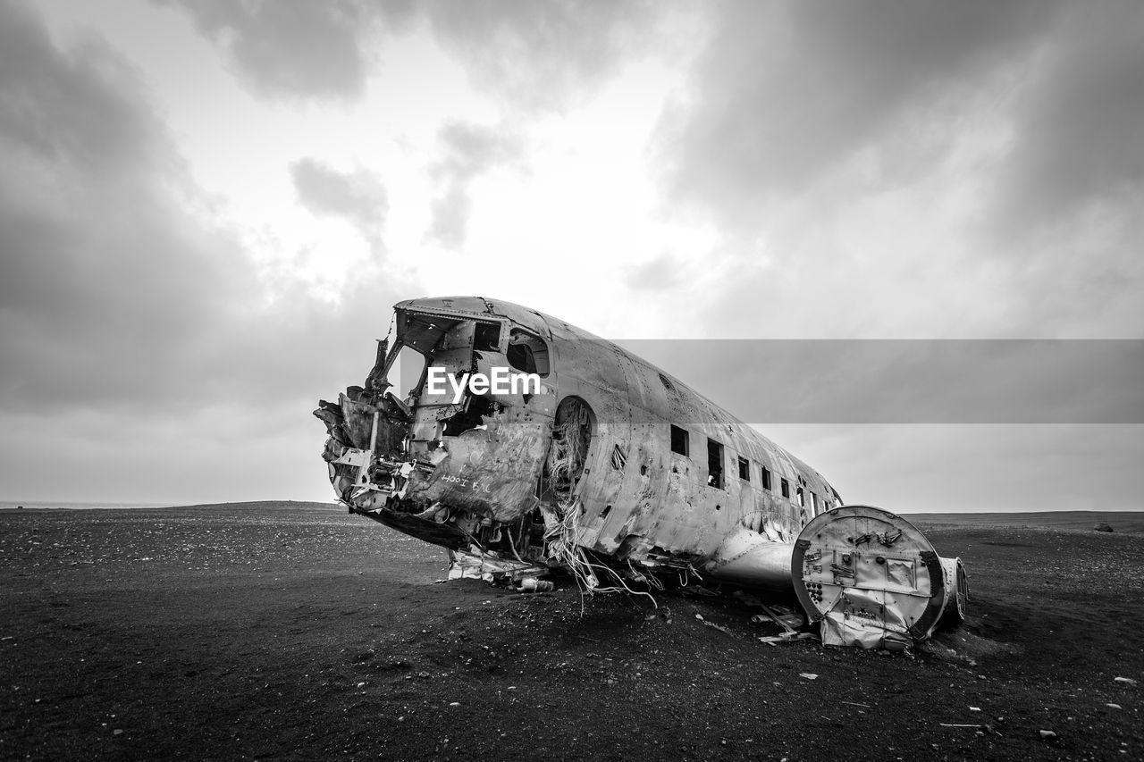 ABANDONED AIRPLANE ON BEACH