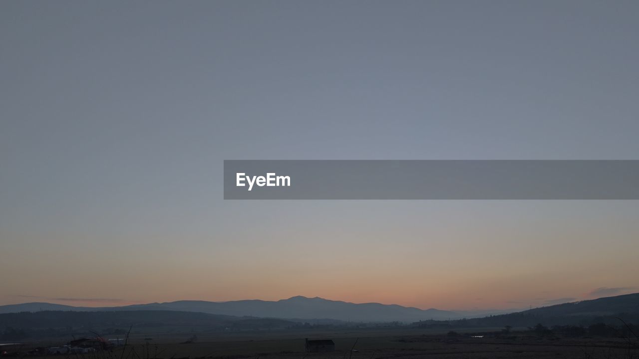 LANDSCAPE AGAINST SKY DURING SUNSET