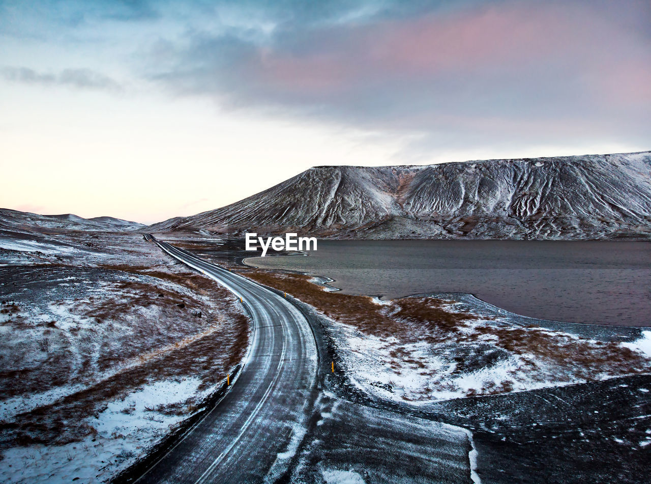 Panoramic view of snowcapped mountain against sky