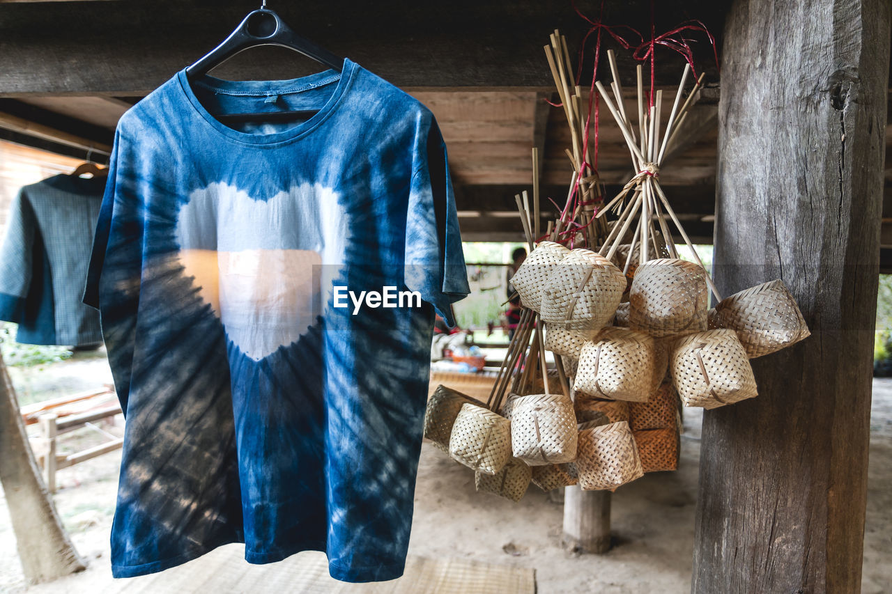 Indigo dyed t-shirts, basket weaving, products that are local knowledge of northeastern thai people