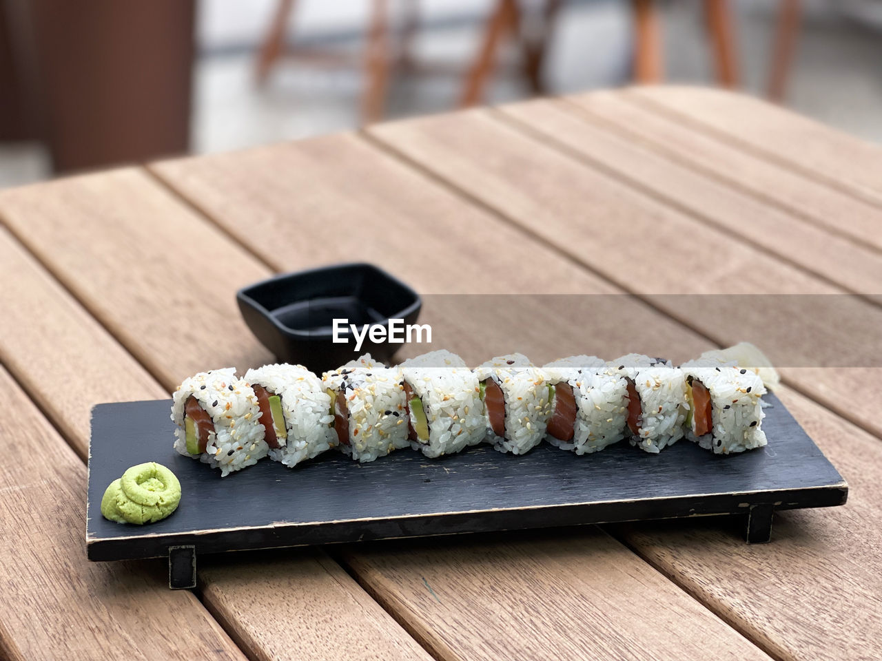 Sushi rolls on a plate in a restaurant