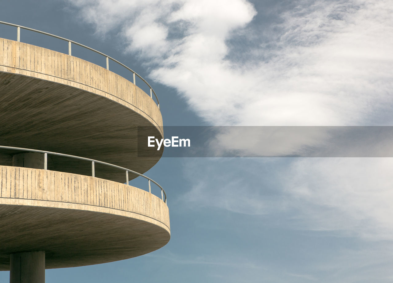 Low angle view of water tower against sky