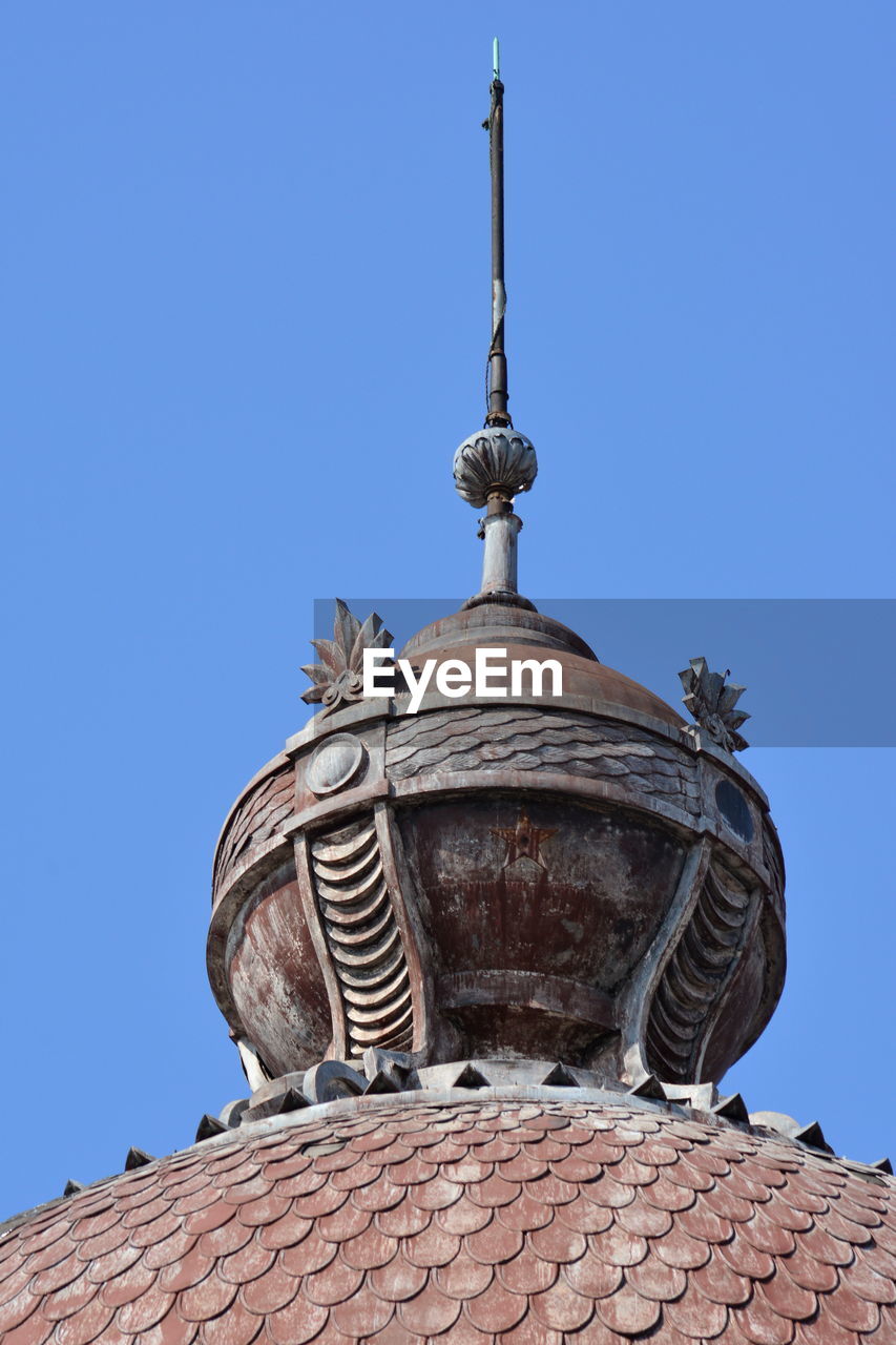 Low angle view of dome against clear blue sky