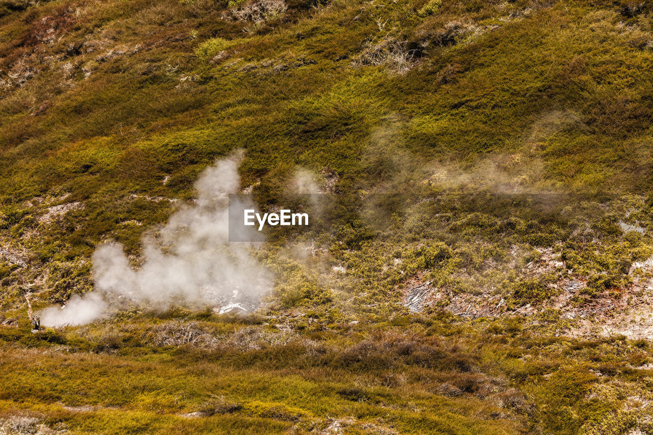 WATER FLOWING THROUGH ROCKS