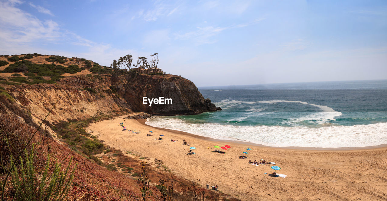 Scenic view of beach against sky