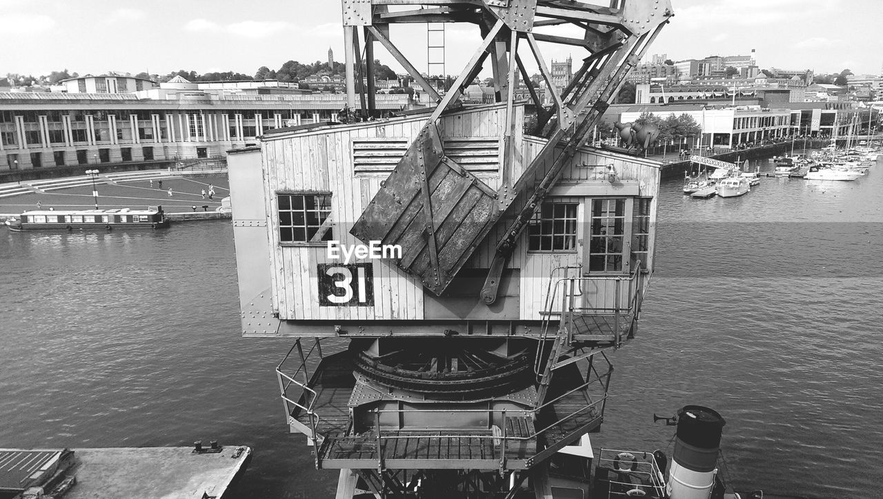 High angle view of crane at harbor