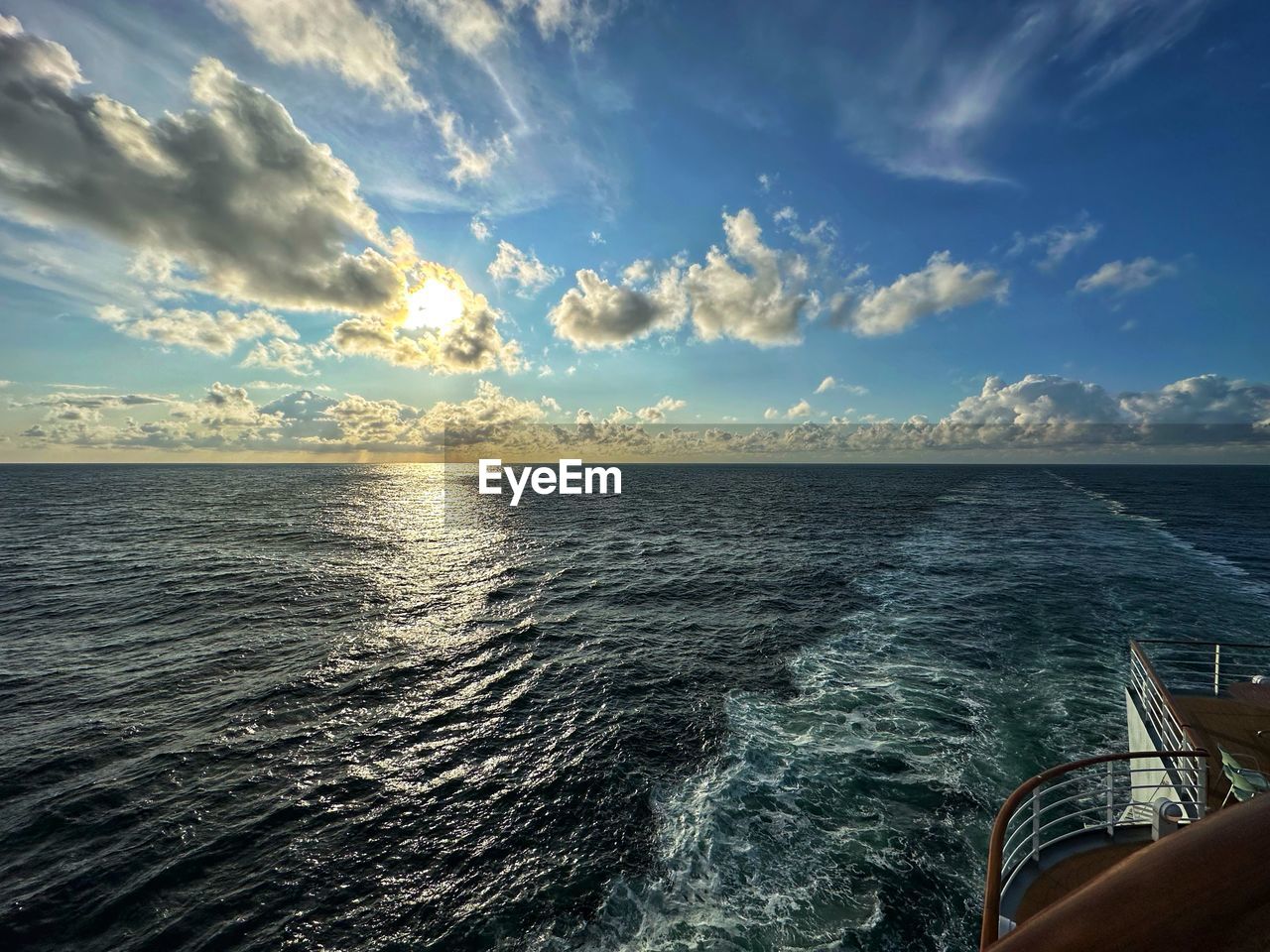 water, sea, sky, horizon, cloud, ocean, nature, scenics - nature, transportation, nautical vessel, beauty in nature, travel, coast, horizon over water, mode of transportation, vehicle, blue, wave, motion, sunset, travel destinations, seascape, outdoors, shore, ship, sailing, sunlight, holiday, vacation, environment, trip, boat, tranquility, summer, land, tranquil scene, no people, tourism, passenger ship, journey, urban skyline, beach, idyllic, bay