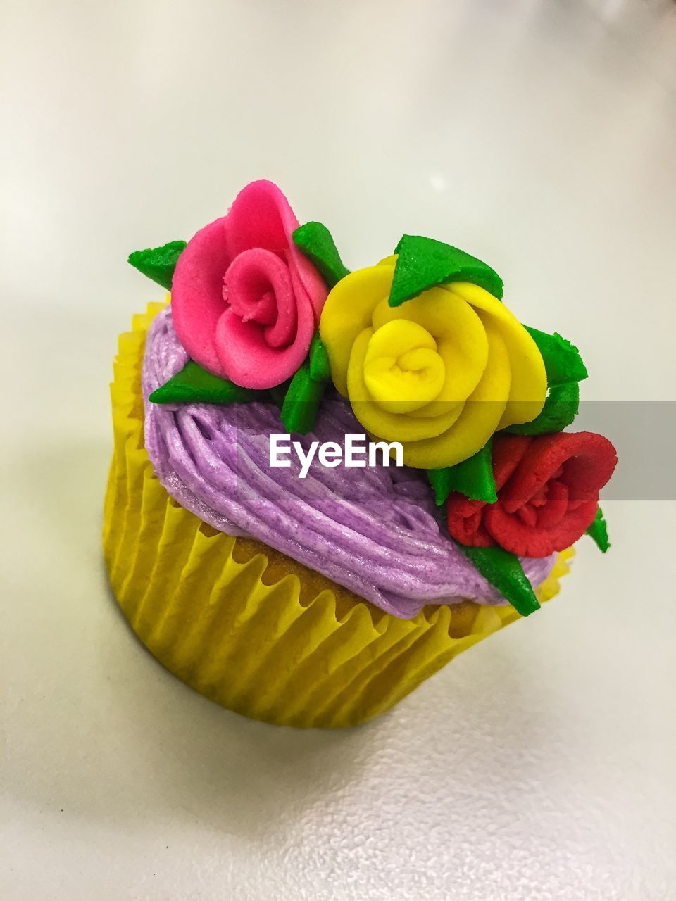Tilt shot of cupcake on table
