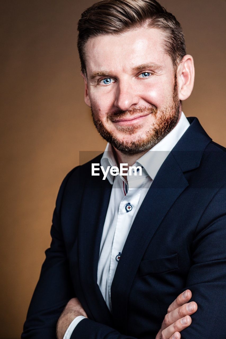 PORTRAIT OF SMILING MAN