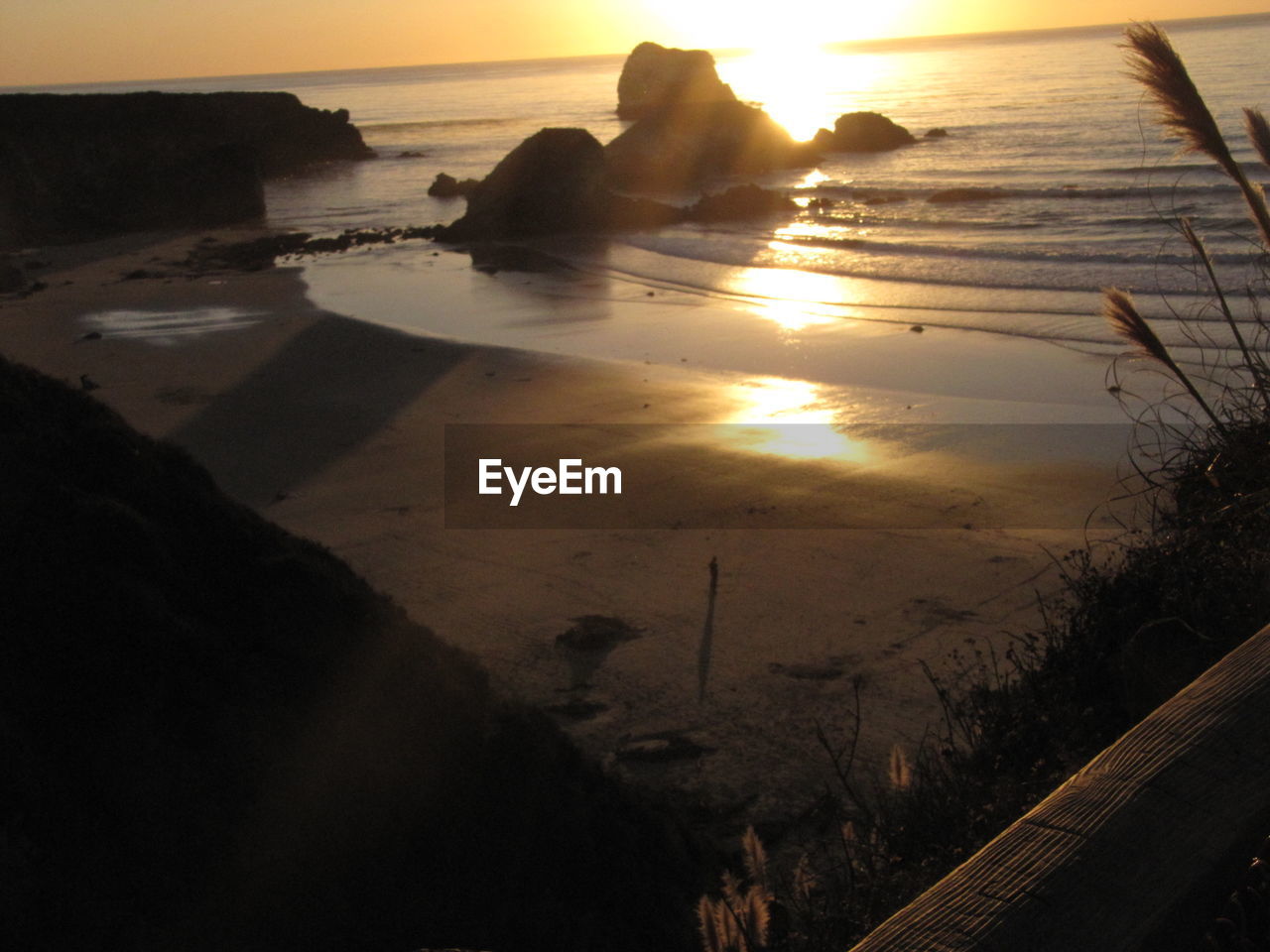 VIEW OF SEA AT SUNSET