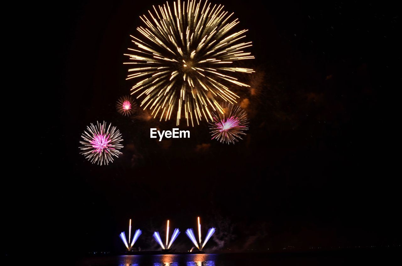 Firework display at night