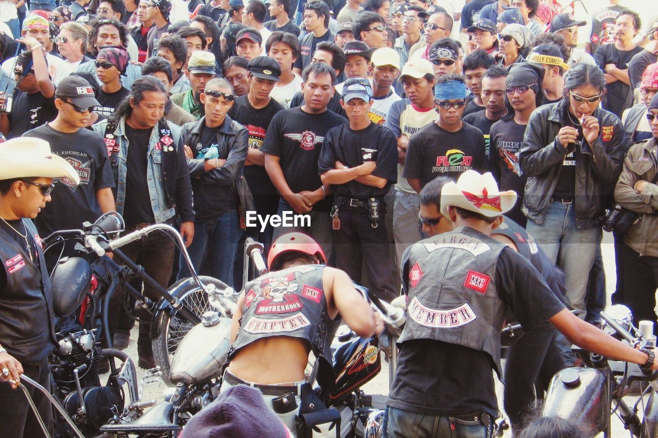 GROUP OF PEOPLE AT STREET MARKET