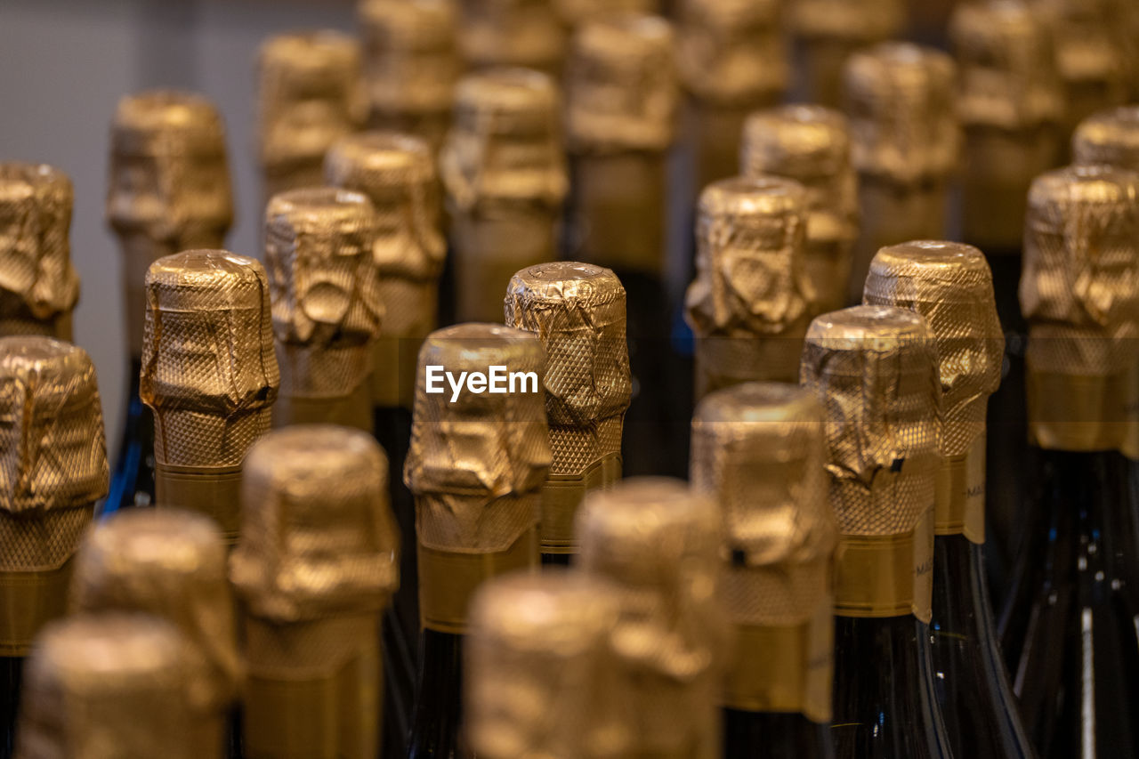 Full frame shot of bottles on table