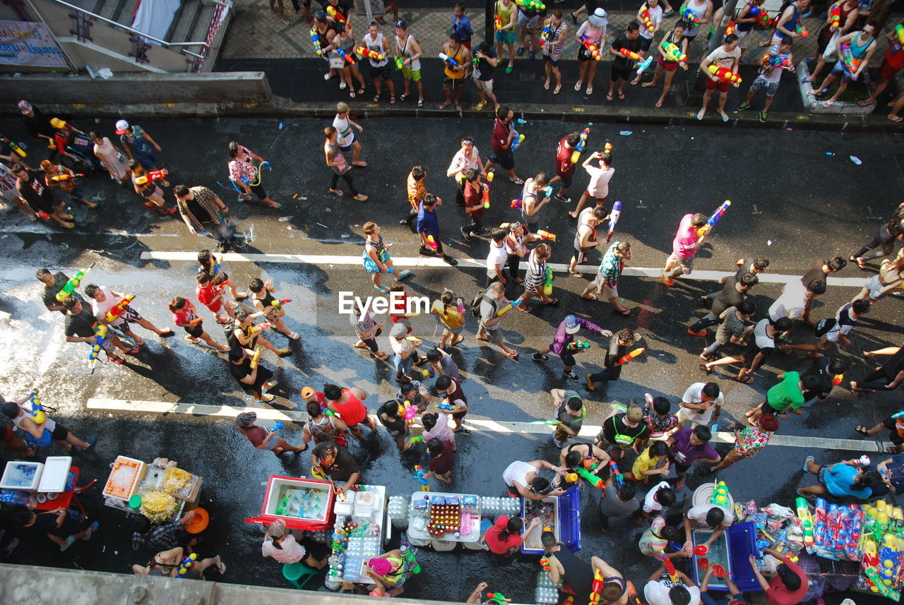 High angle view of people on street in city