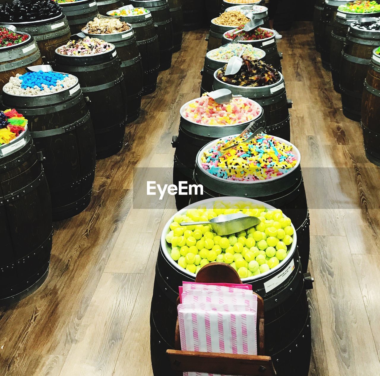 HIGH ANGLE VIEW OF MULTI COLORED FRUITS FOR SALE