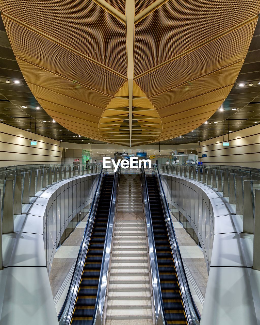 INTERIOR OF ILLUMINATED UNDERGROUND SUBWAY