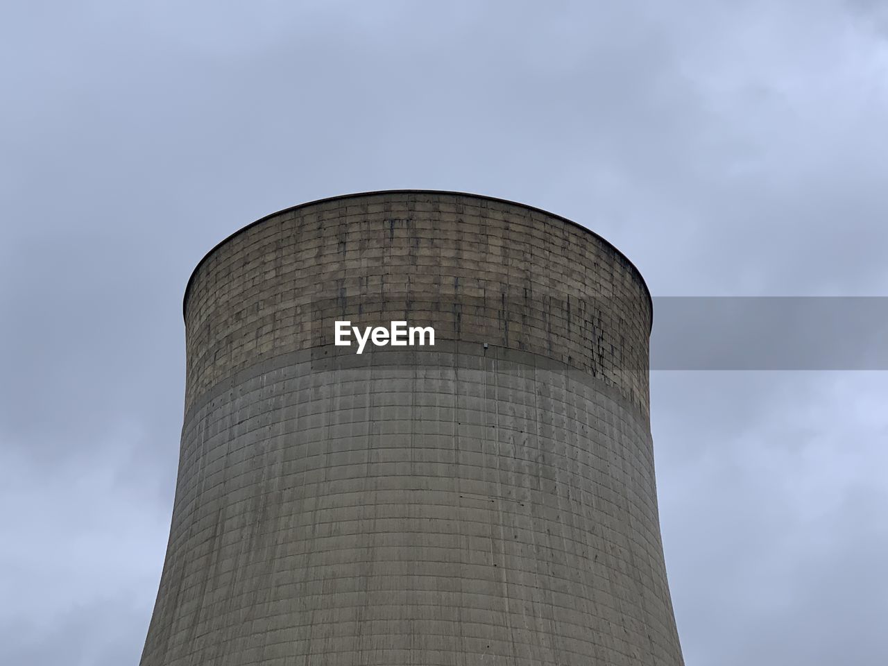 LOW ANGLE VIEW OF WATER TOWER OF FACTORY