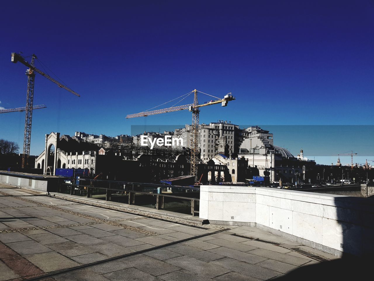 CONSTRUCTION SITE AGAINST CLEAR BLUE SKY