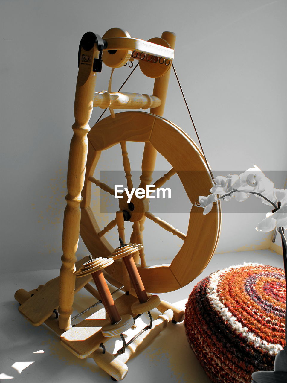 Close-up of spinning weel in a windows niche