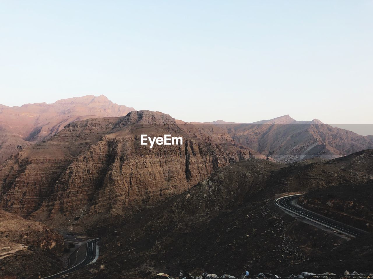 Scenic view of mountains against clear sky