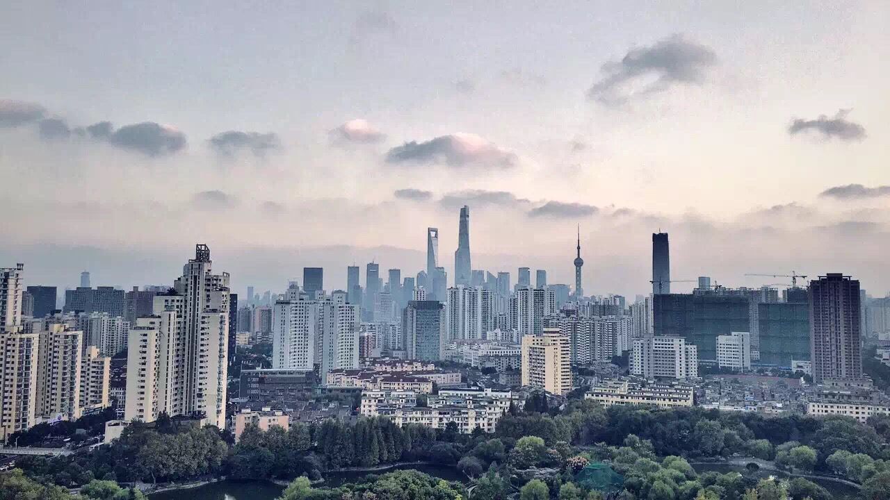 SKYSCRAPERS IN CITY AGAINST SKY