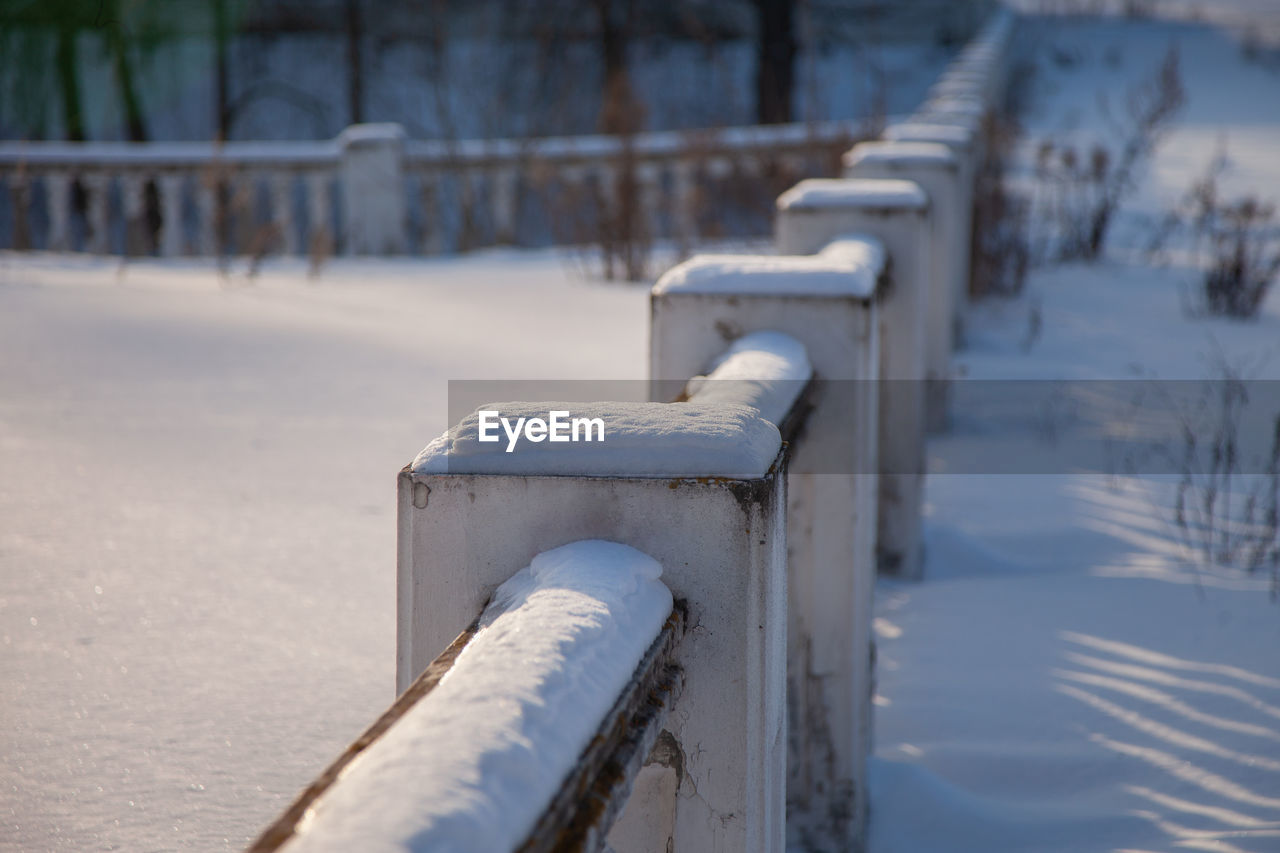 Close-up of snow covered railing