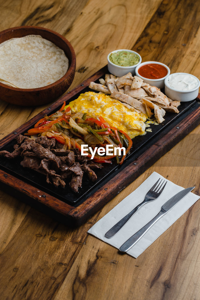 High angle view of meal served on table