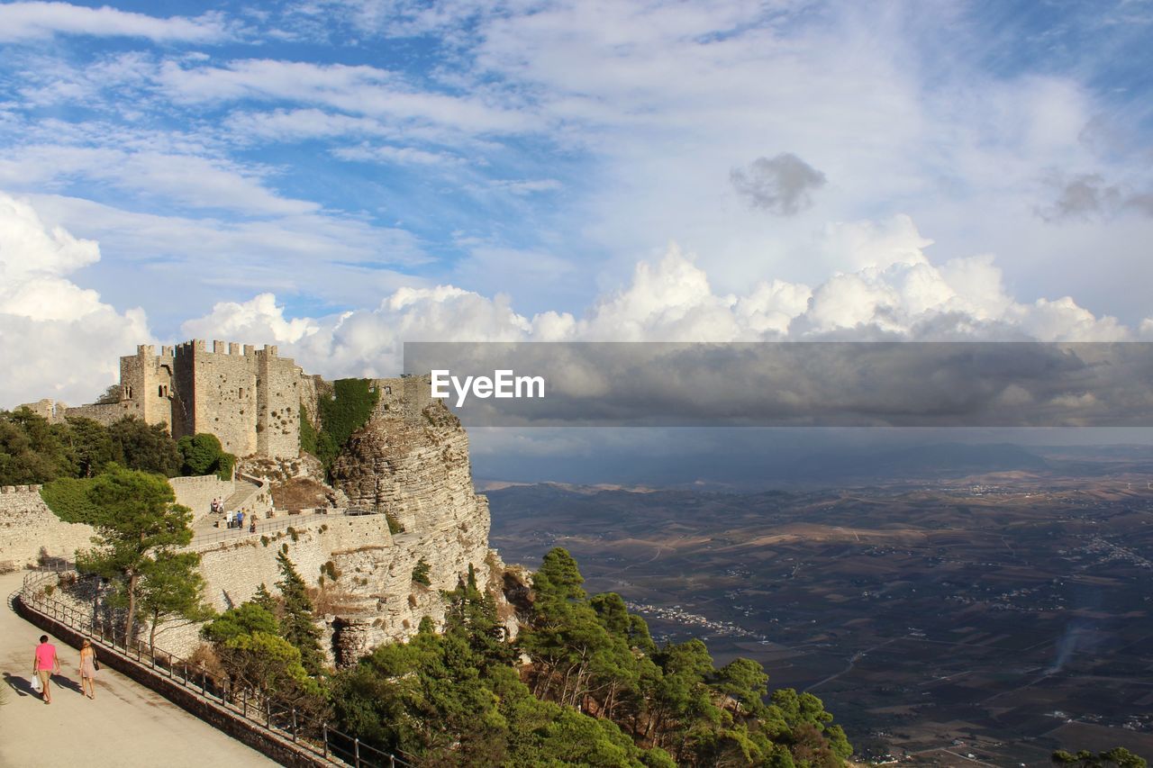 Panoramic view of buildings in city against sky