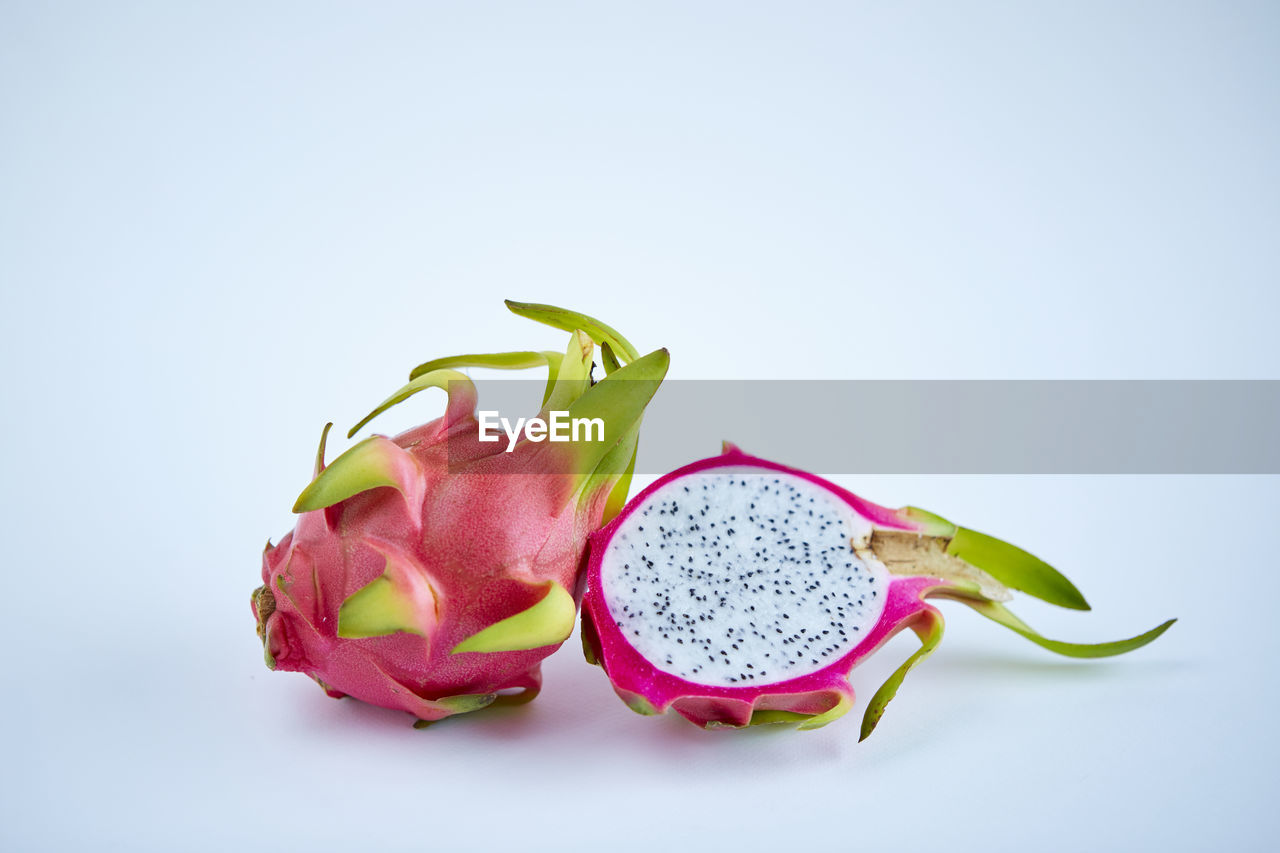 CLOSE-UP OF FRUIT ON WHITE BACKGROUND