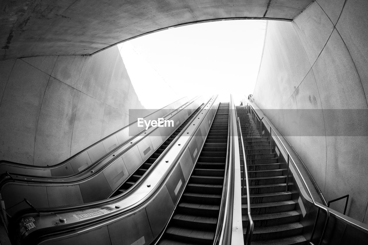 Fish-eye view of escalator at subway station
