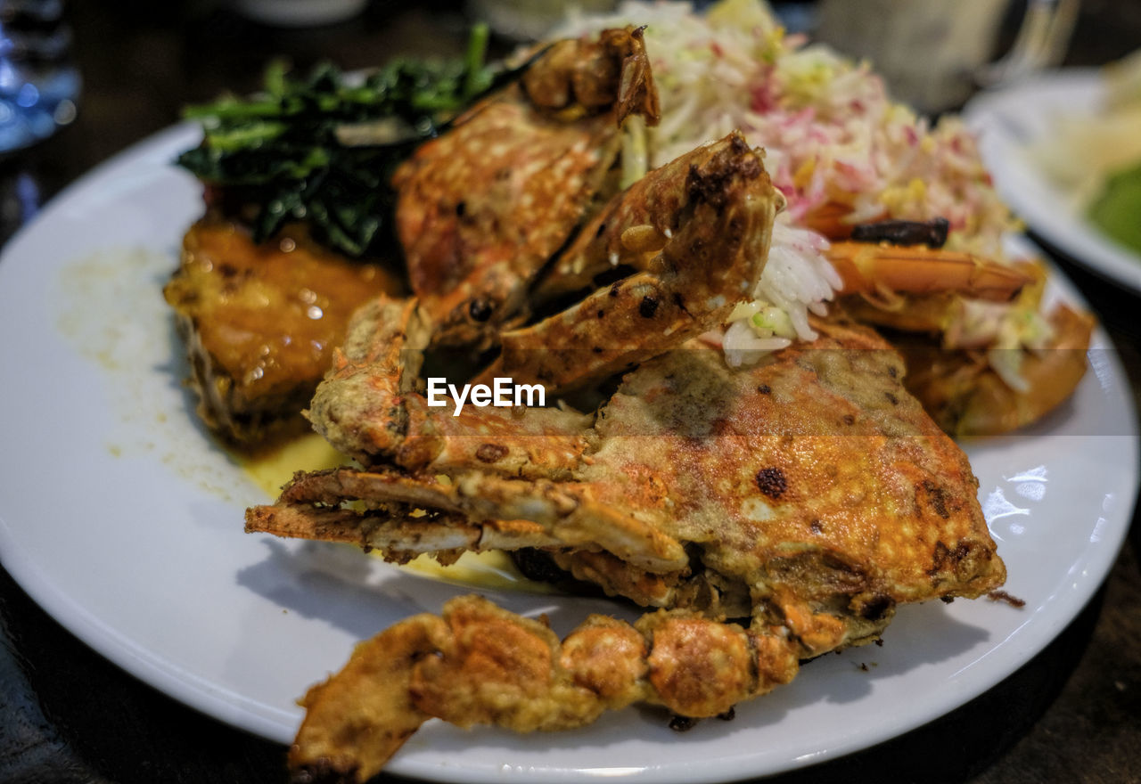 CLOSE-UP OF MEAL SERVED ON TABLE