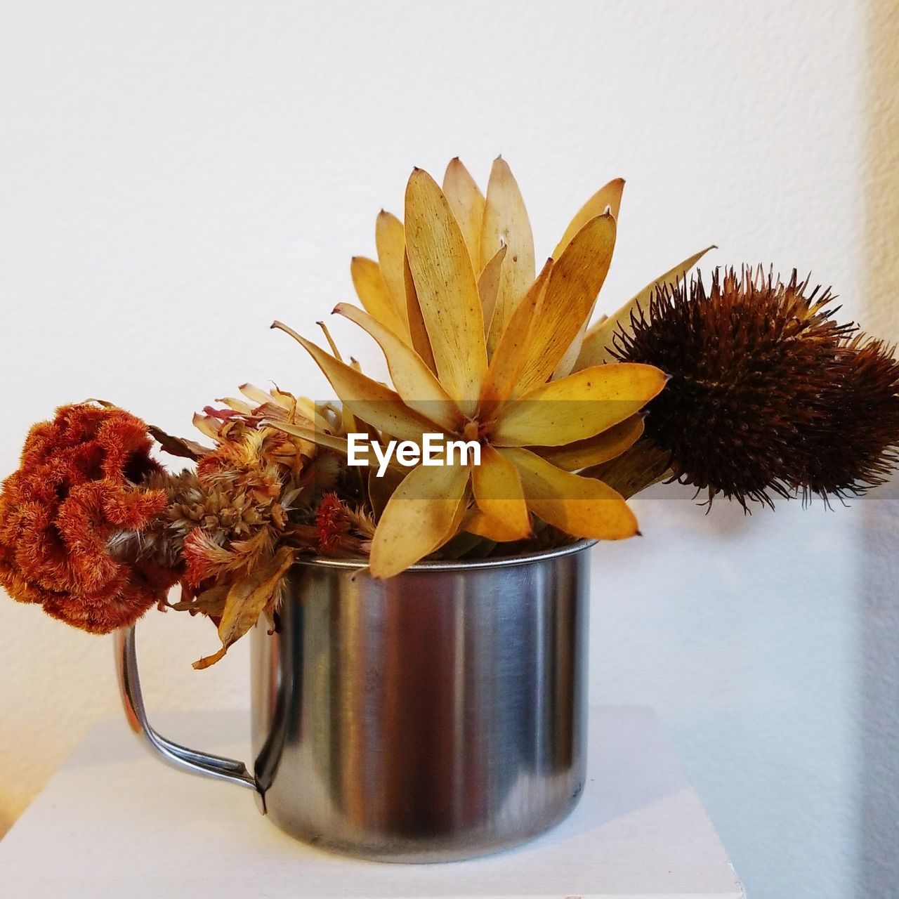 Close-up of flower vase on table