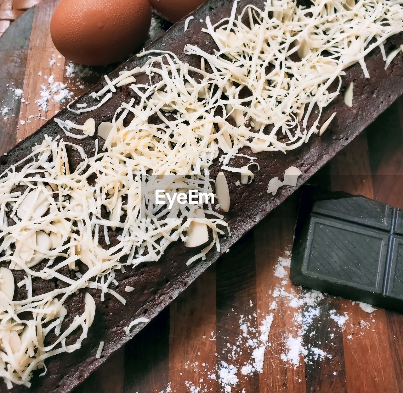 food, food and drink, freshness, wood, egg, indoors, no people, healthy eating, still life, raw food, wellbeing, ingredient, table, flour, high angle view, pasta, baked