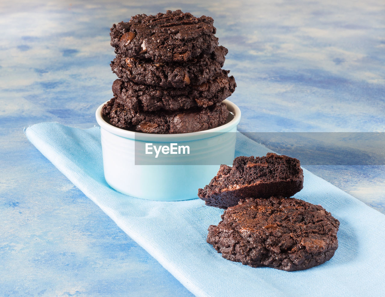 Close-up of chocolate cookies on napkin