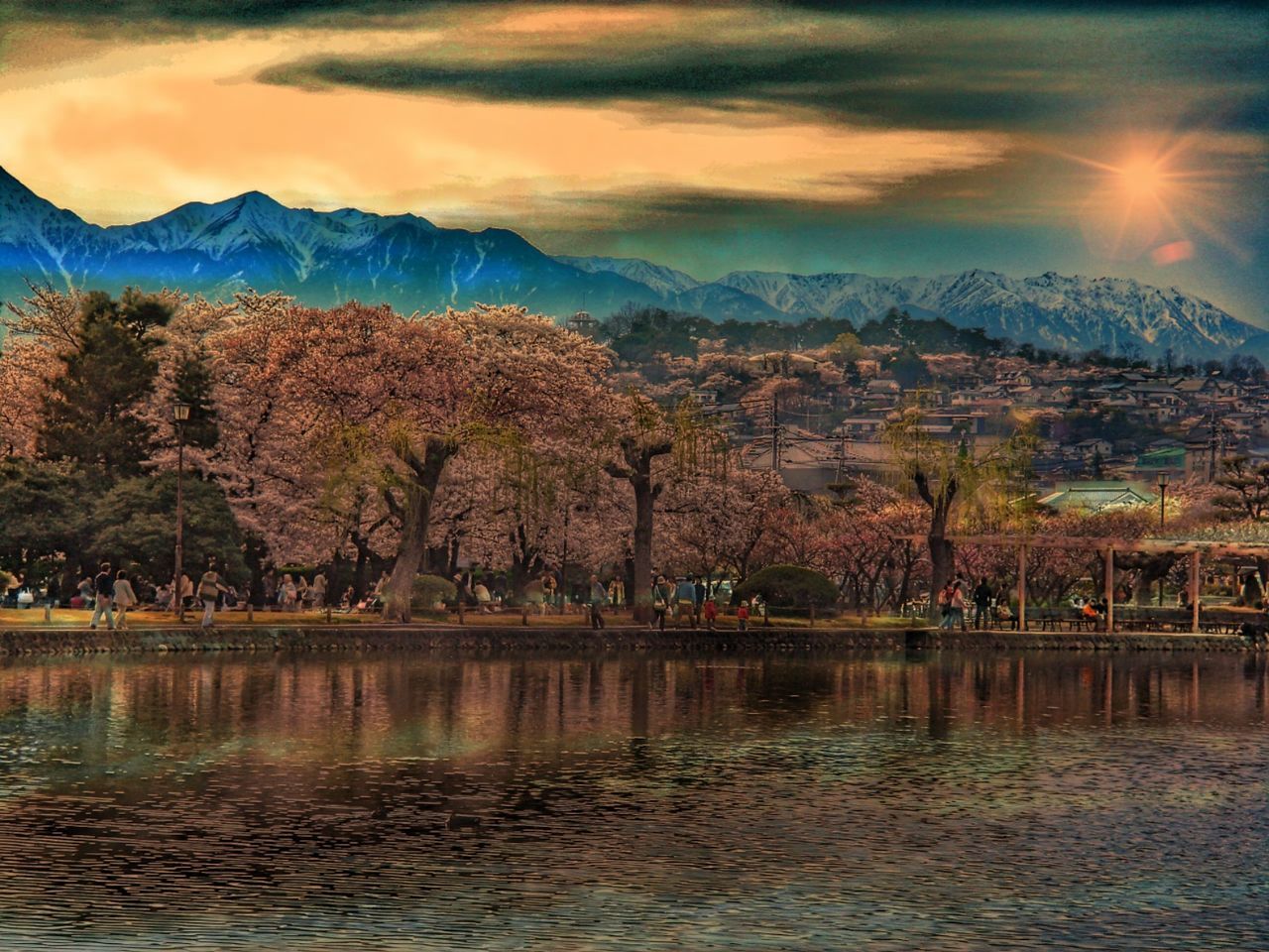 SCENIC VIEW OF LAKE AND MOUNTAINS