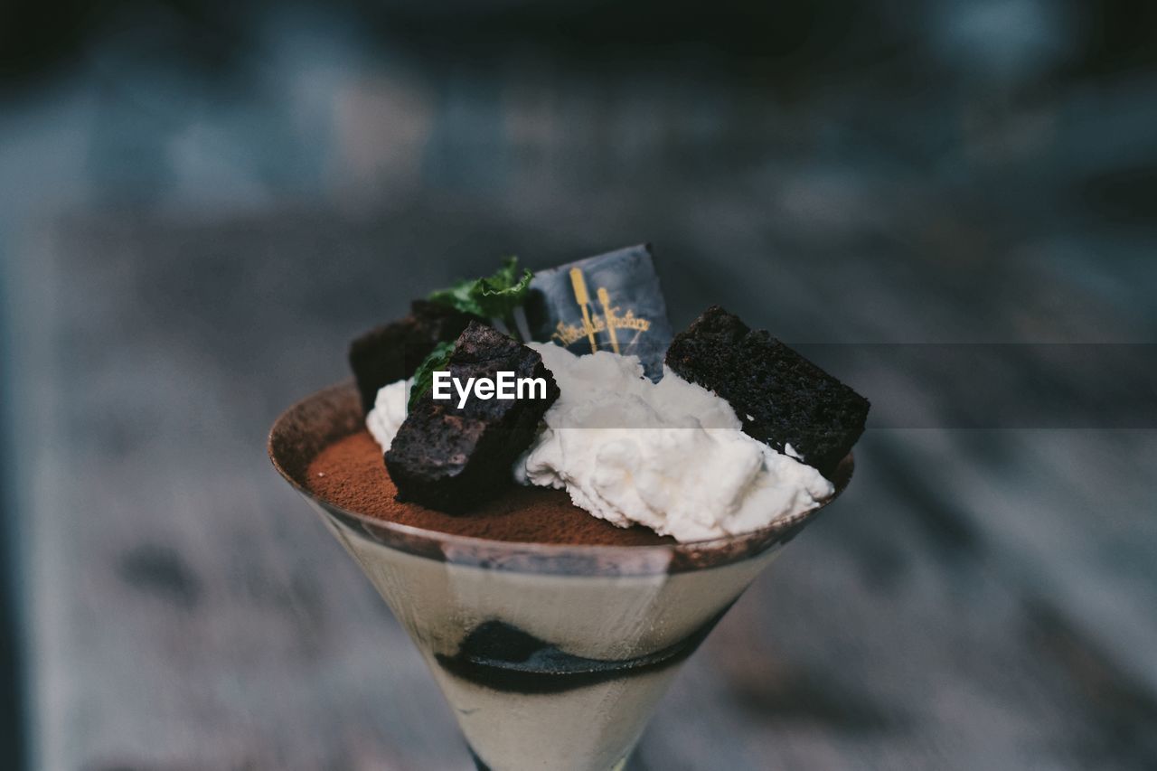 CLOSE-UP OF ICE CREAM IN GLASS