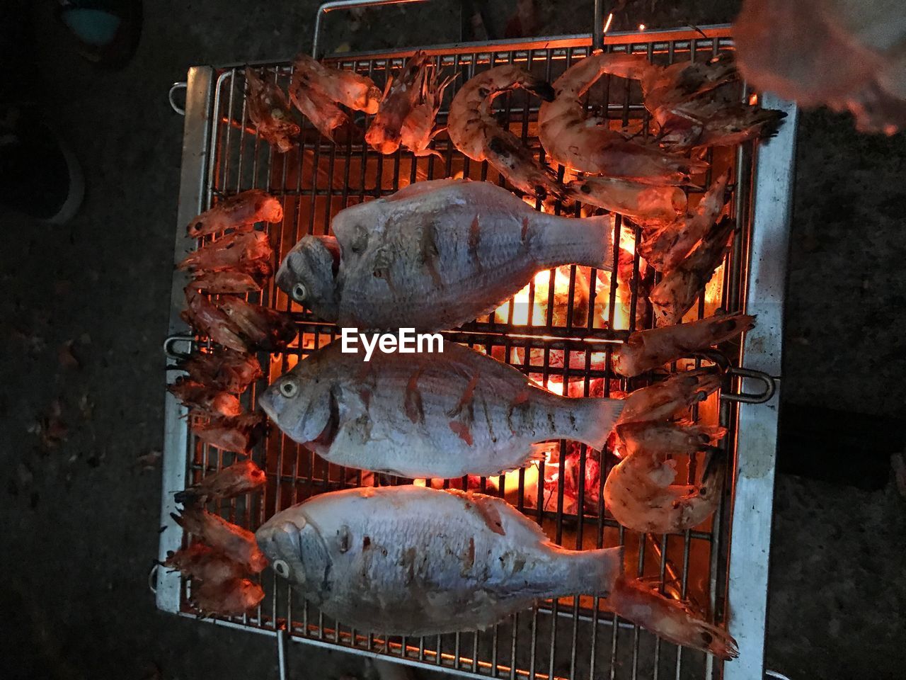 HIGH ANGLE VIEW OF MEAT ON BARBECUE