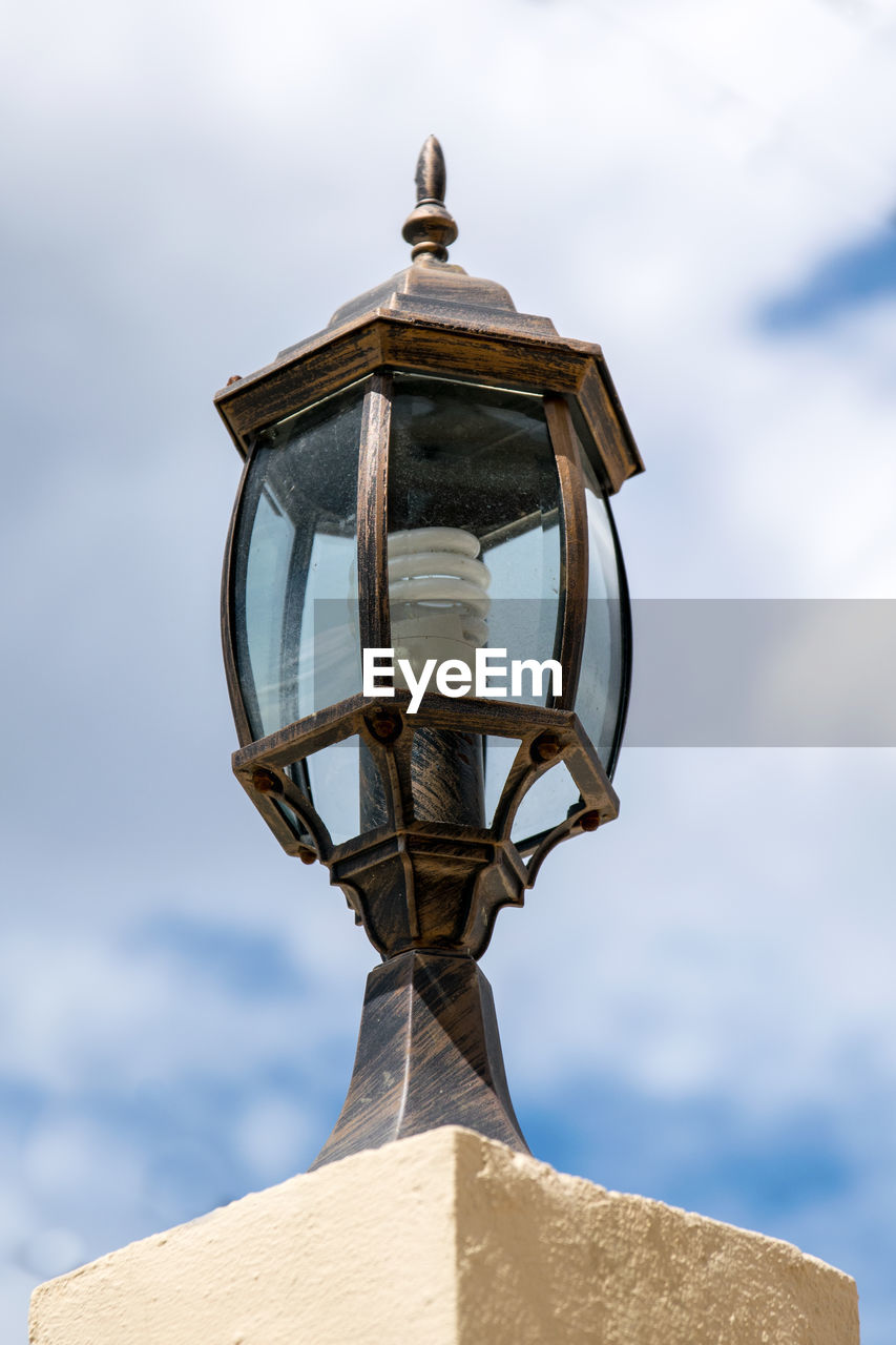 LOW ANGLE VIEW OF STREET LIGHT AGAINST SKY