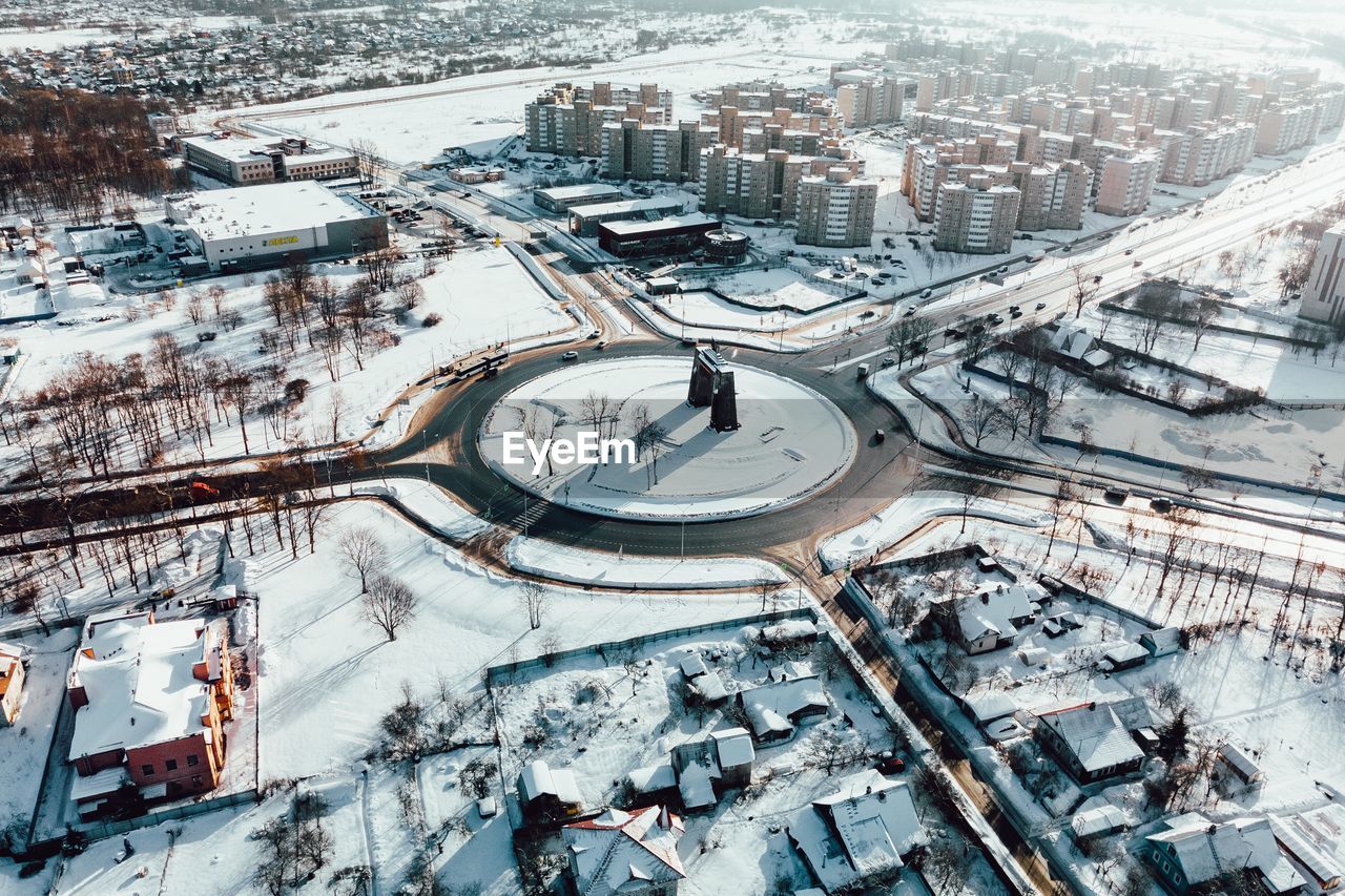 High angle view of snow covered cityscape