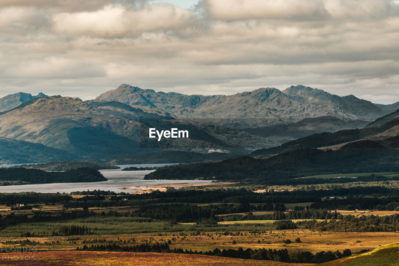 Scenic view of landscape and mountains against sky in scotland 
