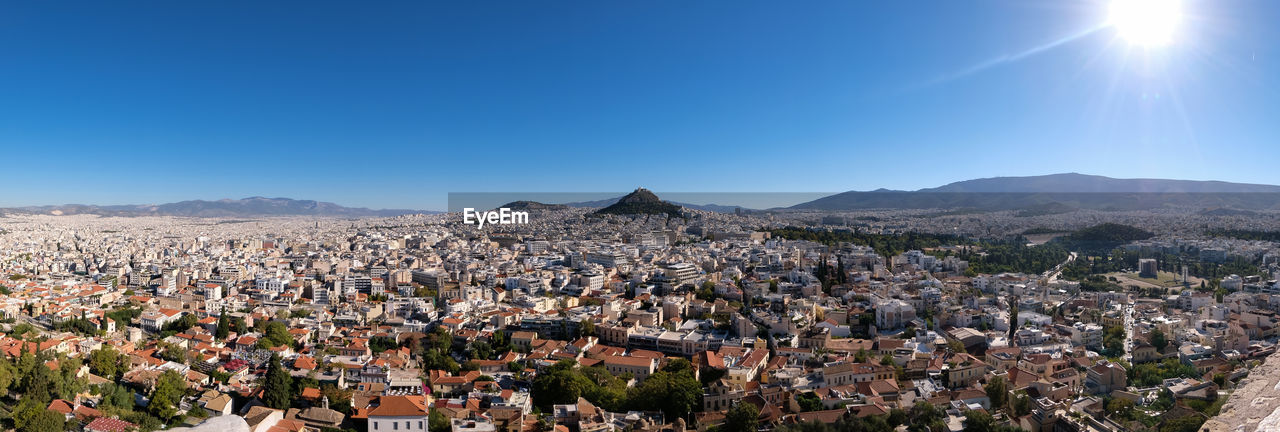 aerial view of townscape against sky