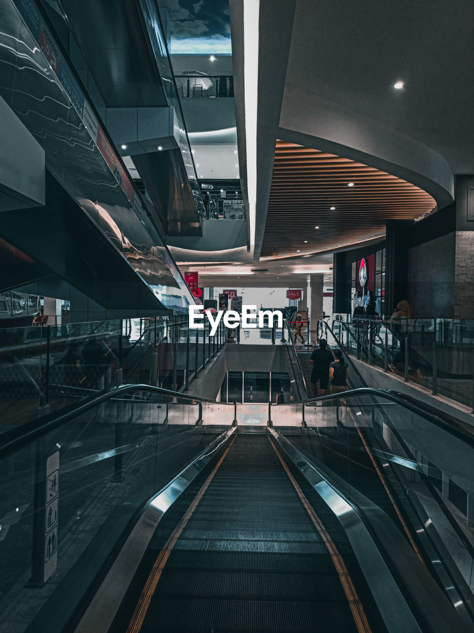 HIGH ANGLE VIEW OF ESCALATORS IN CITY